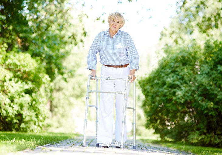 woman with a walker in the park